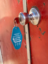 Load image into Gallery viewer, Lost Inn Austin Motel keychain